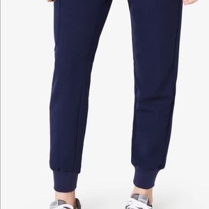 Navy blue FIGS scrub bottoms.